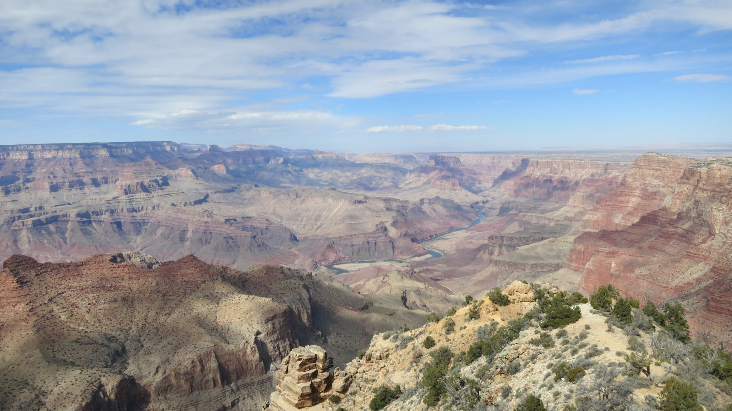 Brown and Green Mountains Under Blue Sky During Daytime. Wallpaper in 2560x1440 Resolution