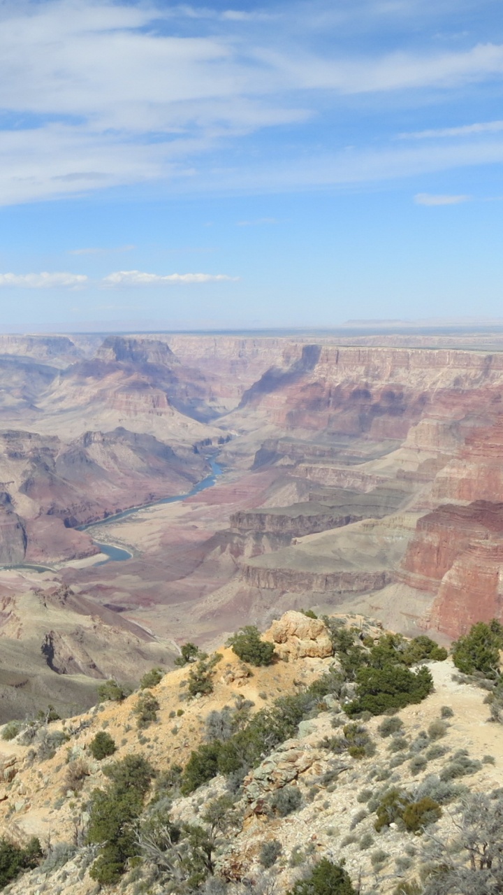 Brown and Green Mountains Under Blue Sky During Daytime. Wallpaper in 720x1280 Resolution