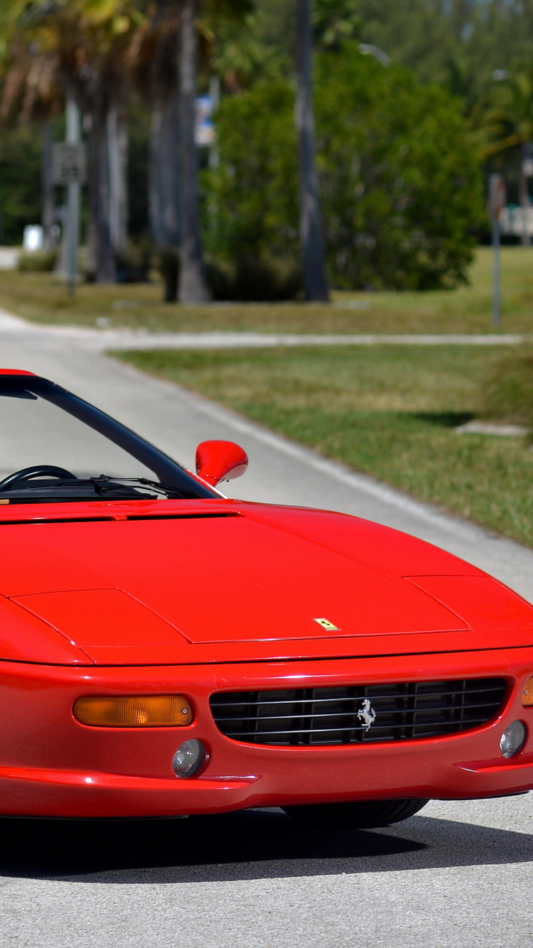 Roter Ferrari 458 Italia Tagsüber Unterwegs. Wallpaper in 750x1334 Resolution