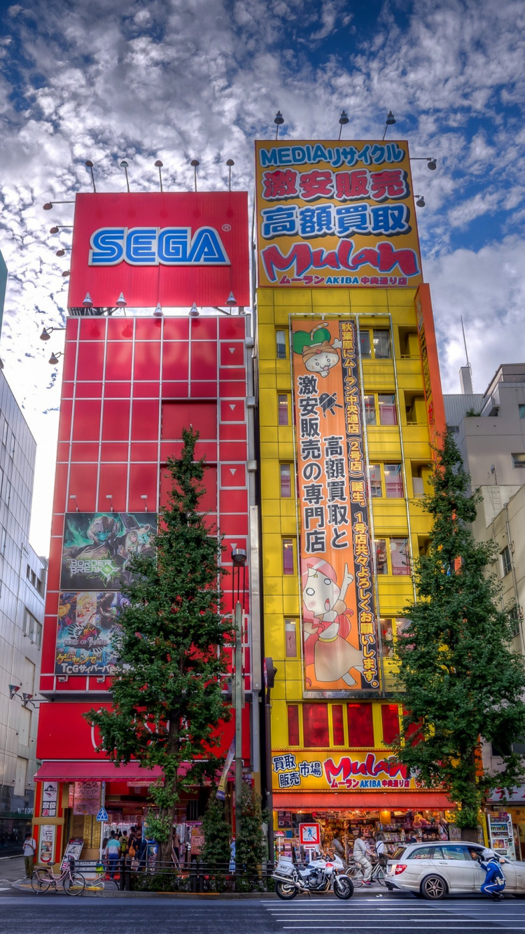 Cars Parked in Front of Building During Daytime. Wallpaper in 750x1334 Resolution