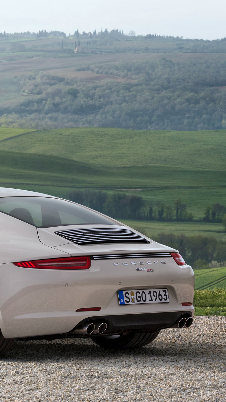 Silver Porsche 911 on Gray Dirt Road During Daytime. Wallpaper in 750x1334 Resolution