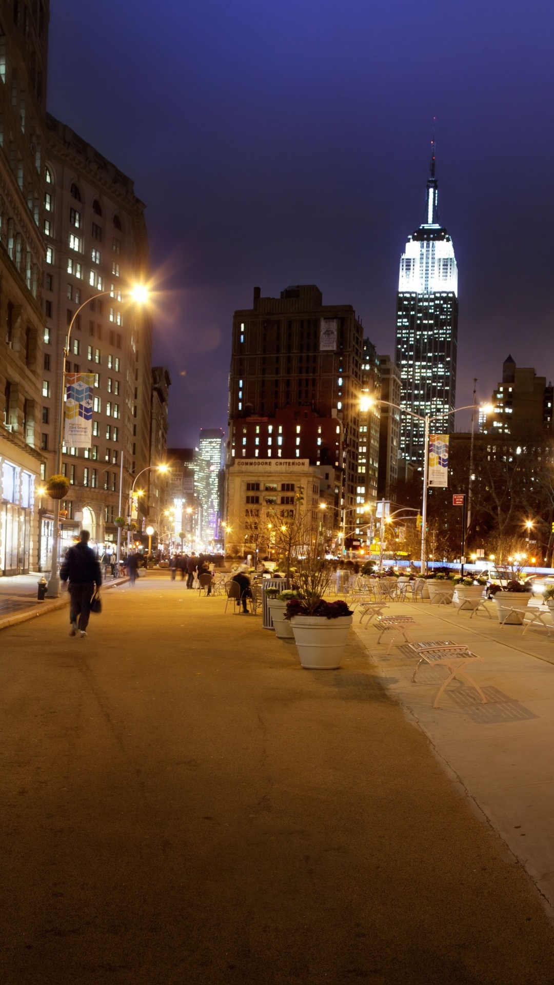 People Walking on Sidewalk Near Building During Night Time. Wallpaper in 1080x1920 Resolution