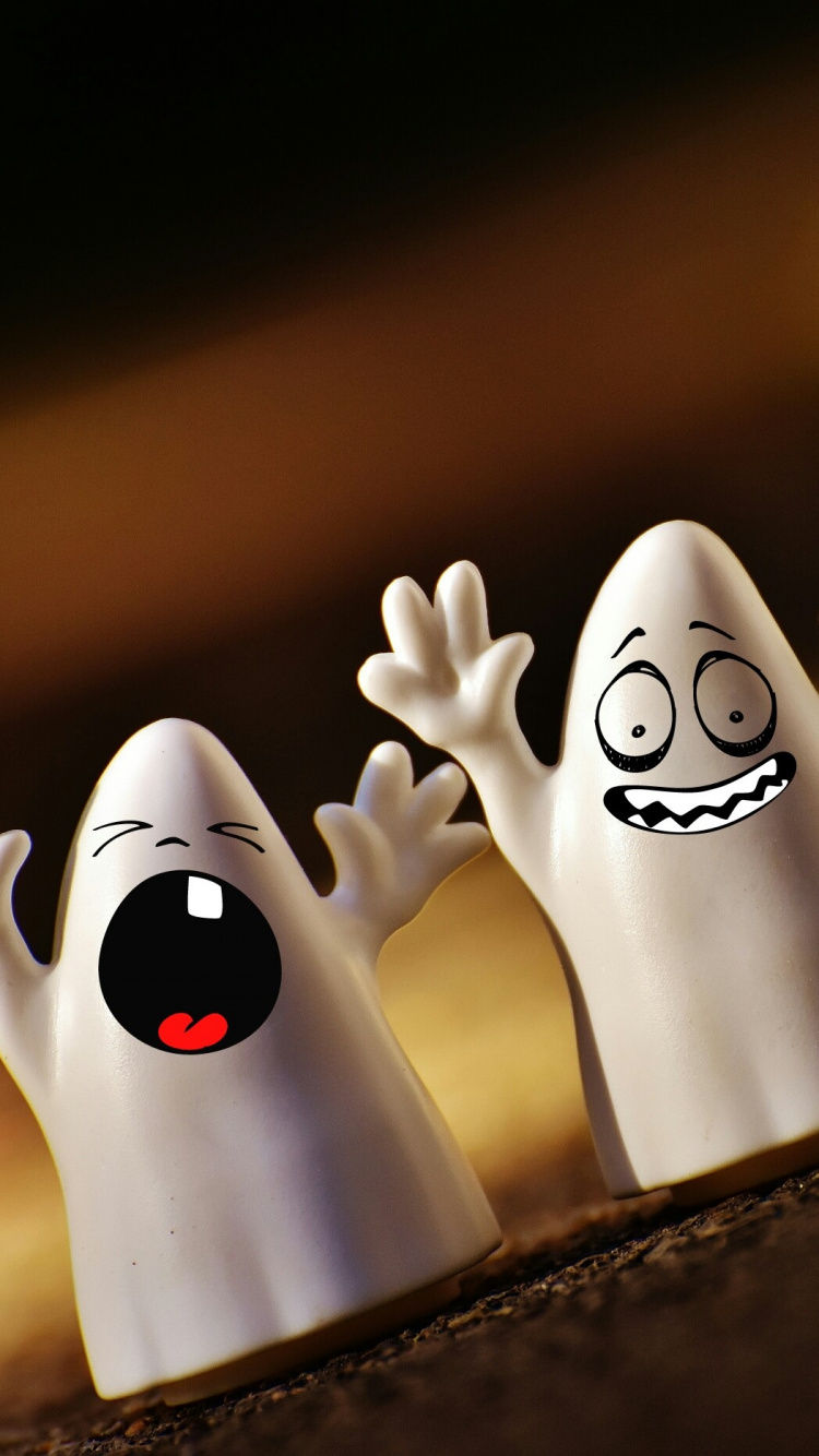 White and Black Ghost Figurines. Wallpaper in 750x1334 Resolution