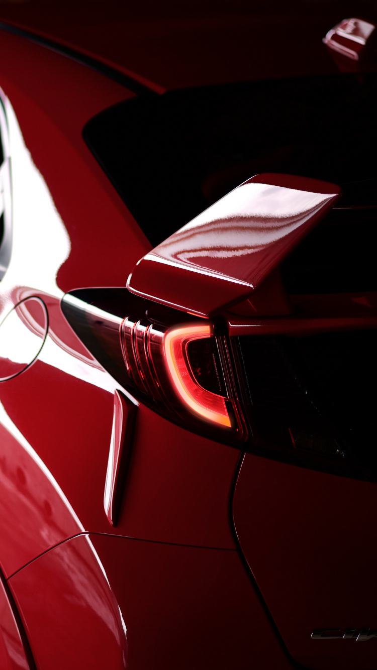 Red Coupe on Gray Asphalt Road During Daytime. Wallpaper in 750x1334 Resolution