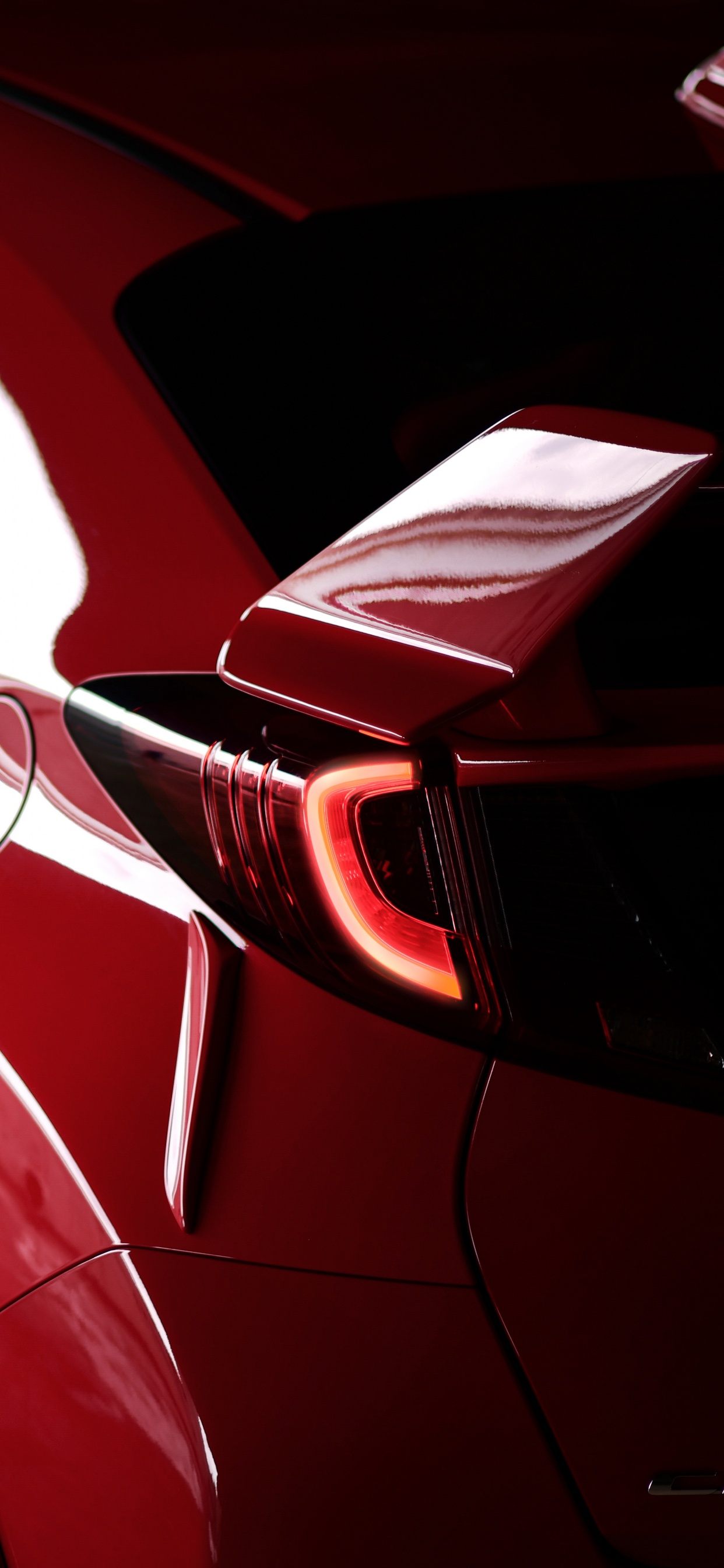 Coupe Rojo Sobre la Carretera de Asfalto Gris Durante el Día. Wallpaper in 1242x2688 Resolution