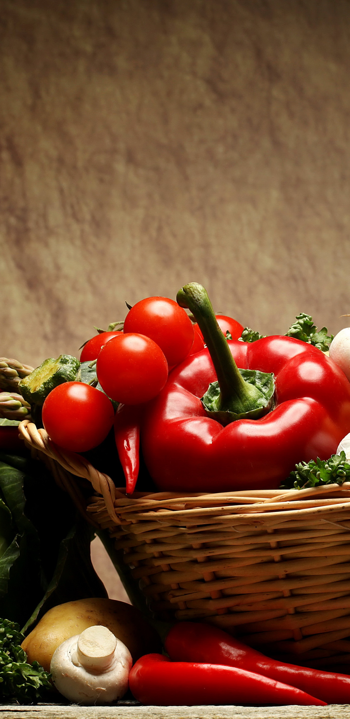 Red Tomatoes and Green Vegetable on Brown Woven Basket. Wallpaper in 1440x2960 Resolution