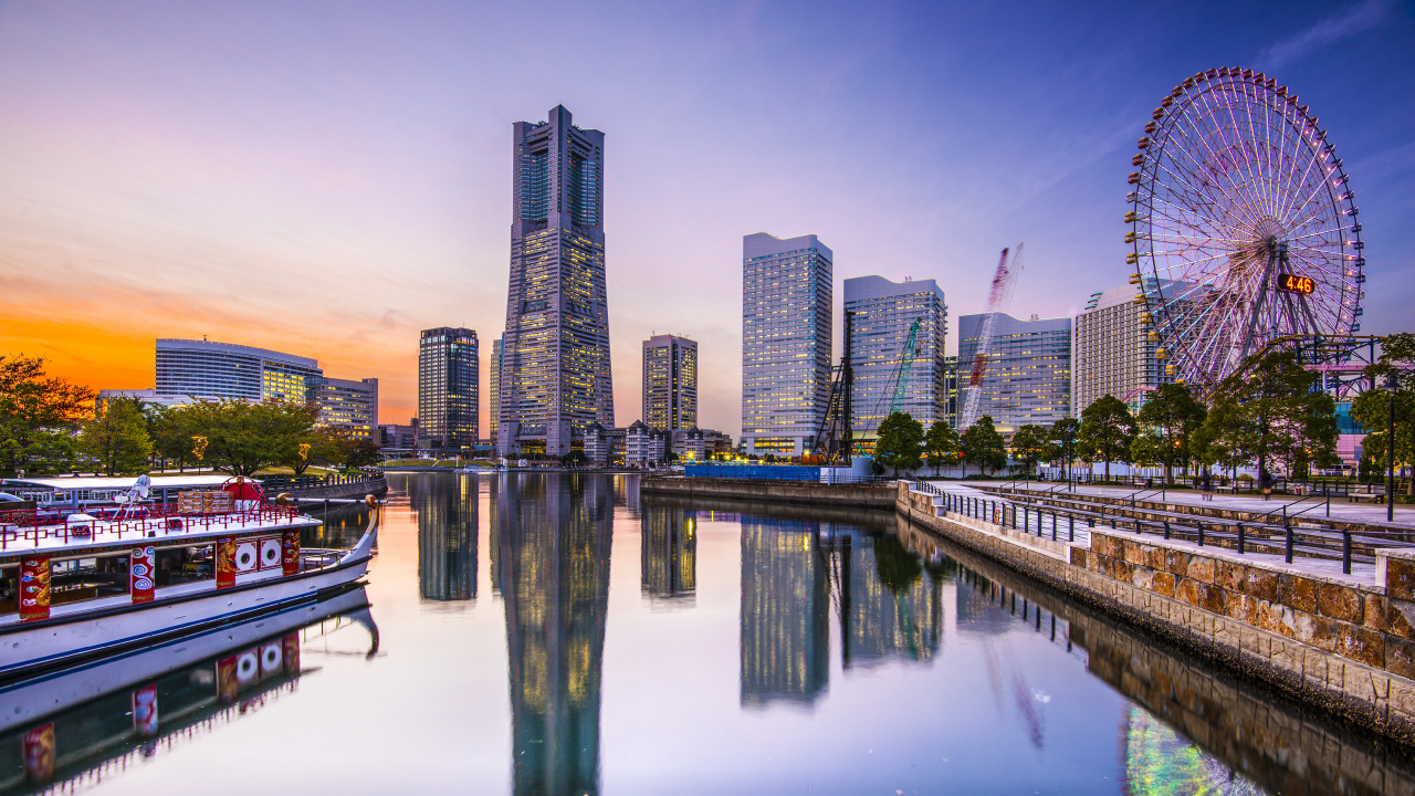 City Skyline Across Body of Water During Night Time. Wallpaper in 1280x720 Resolution