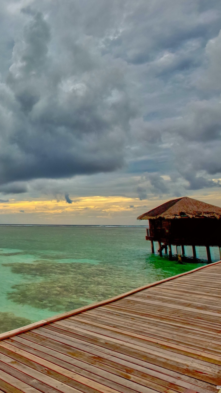 Brown Wooden Dock on Sea Under White Clouds During Daytime. Wallpaper in 750x1334 Resolution