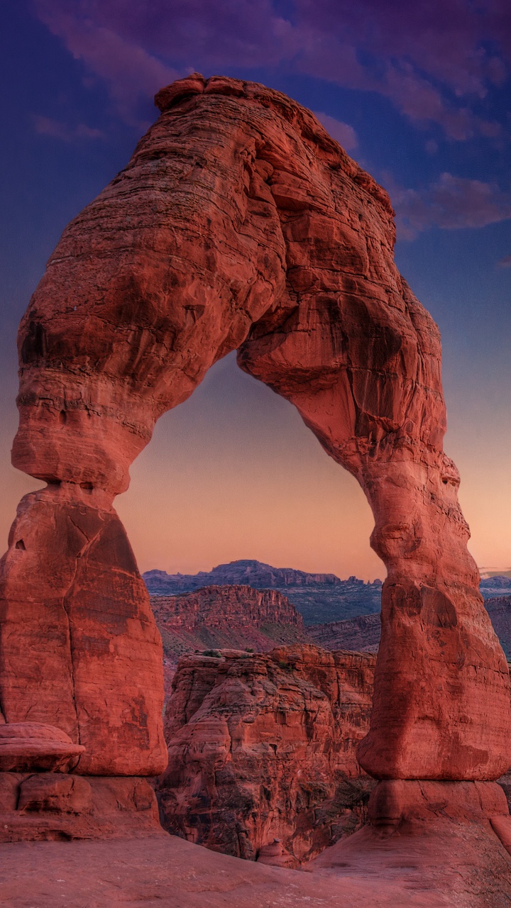 Brown Rock Formation Near Body of Water During Daytime. Wallpaper in 720x1280 Resolution