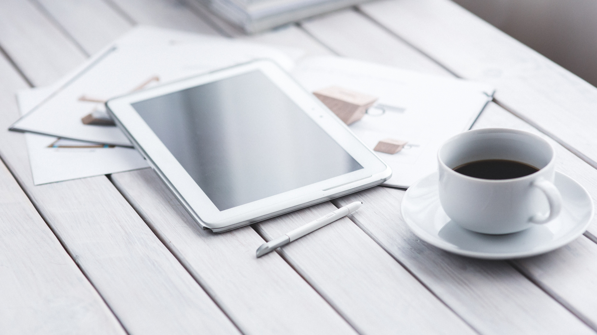 White Ipad on White Book Page Beside White Ceramic Mug on Table. Wallpaper in 1920x1080 Resolution