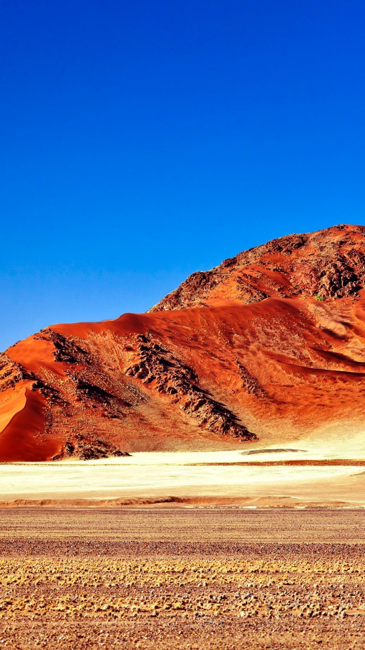 Brown Rocky Mountain Under Blue Sky During Daytime. Wallpaper in 720x1280 Resolution