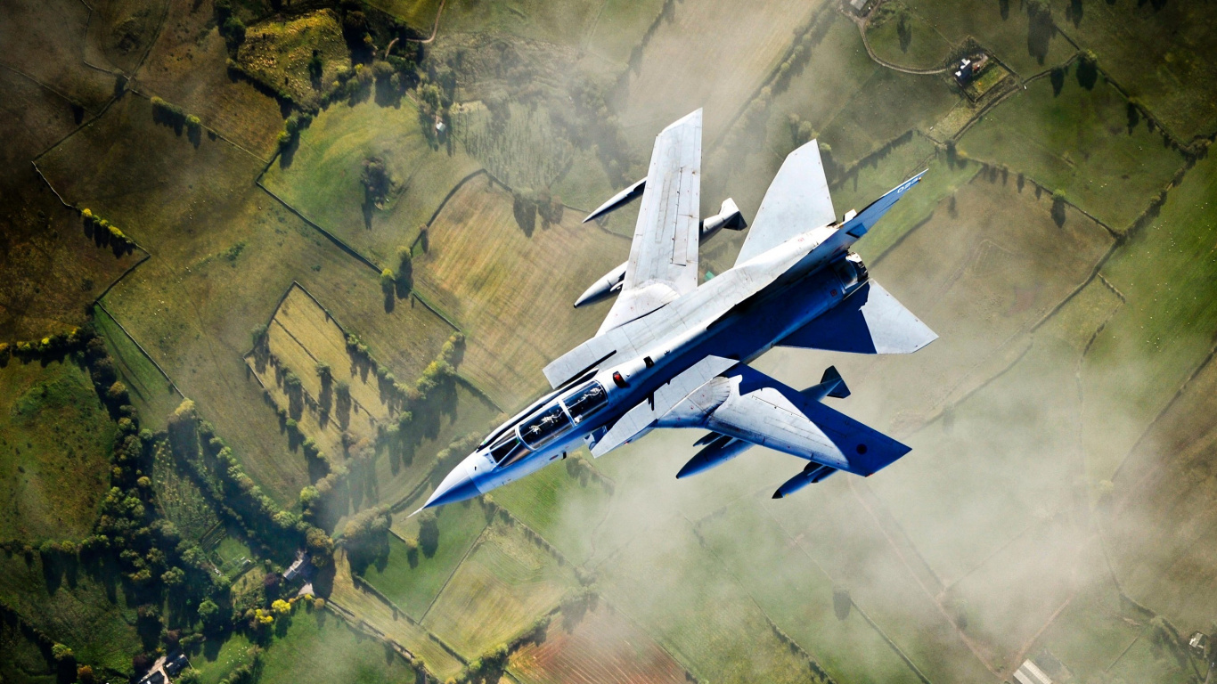 White and Blue Jet Plane Flying Over Green Grass Field During Daytime. Wallpaper in 1366x768 Resolution