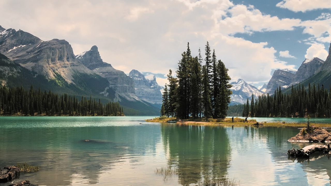 Green Pine Trees Near Lake and Mountains During Daytime. Wallpaper in 1280x720 Resolution
