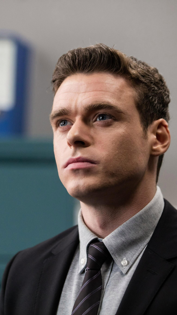 Homme en Veste de Costume Noir. Wallpaper in 750x1334 Resolution