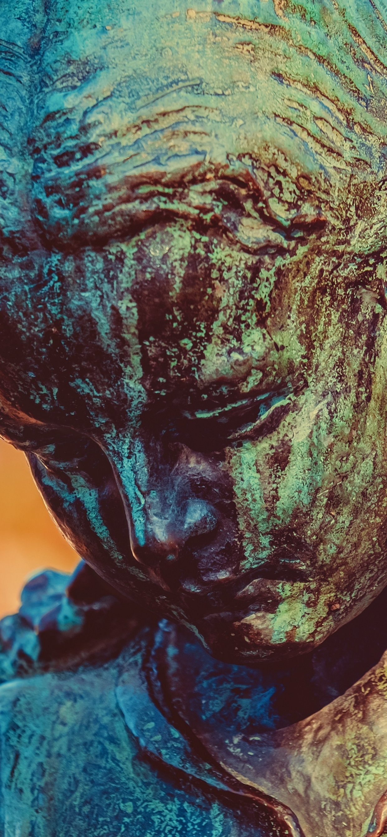 Black Concrete Statue of Man. Wallpaper in 1242x2688 Resolution