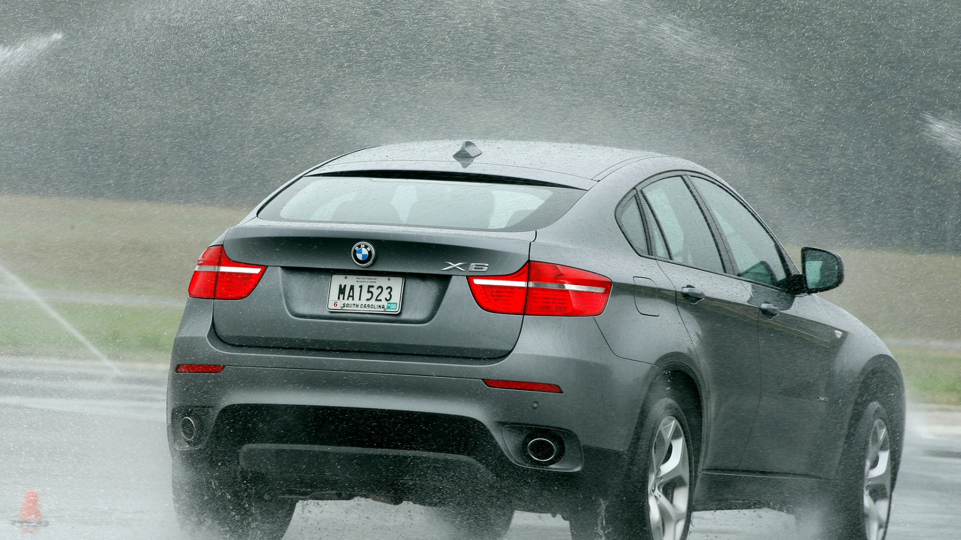 Black Bmw x 6 on Gray Asphalt Road. Wallpaper in 1920x1080 Resolution