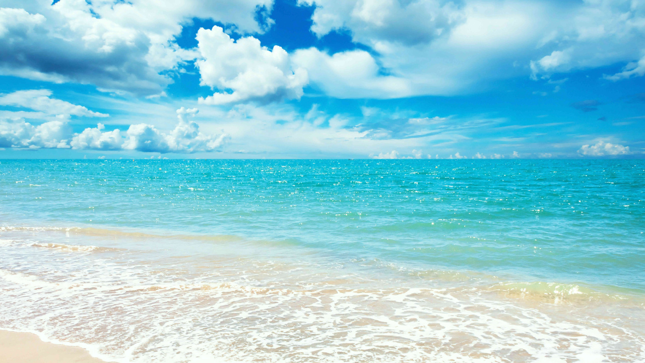 Blue Sea Under Blue Sky and White Clouds During Daytime. Wallpaper in 1280x720 Resolution