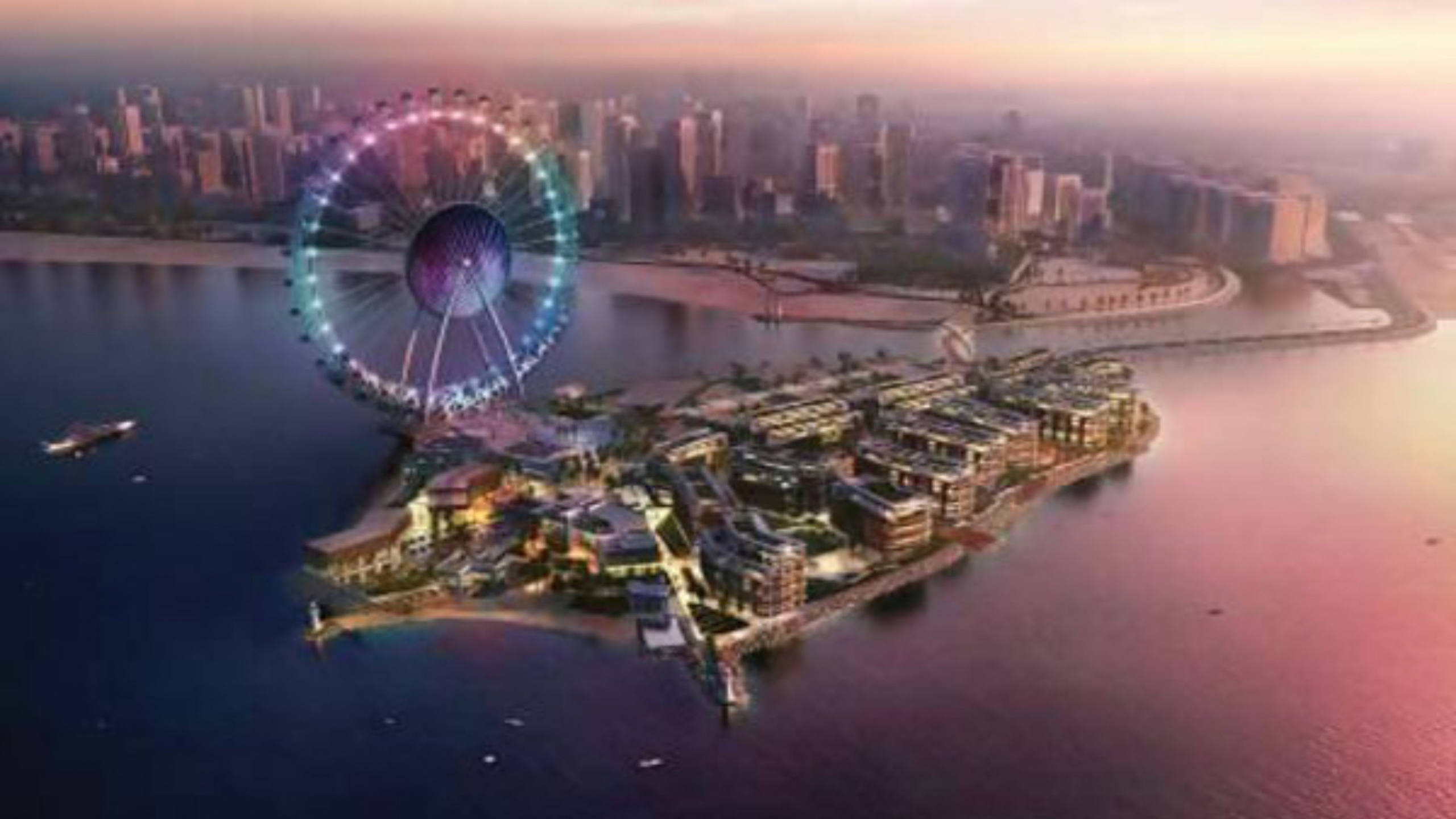 Luftaufnahme Von Stadtgebäuden Während Der Nacht. Wallpaper in 2560x1440 Resolution