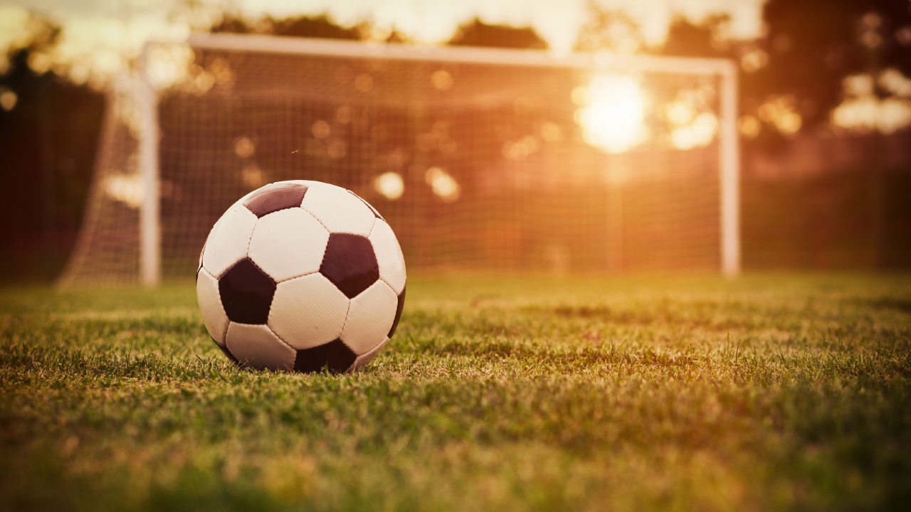 White and Black Soccer Ball on Green Grass Field During Daytime. Wallpaper in 1280x720 Resolution