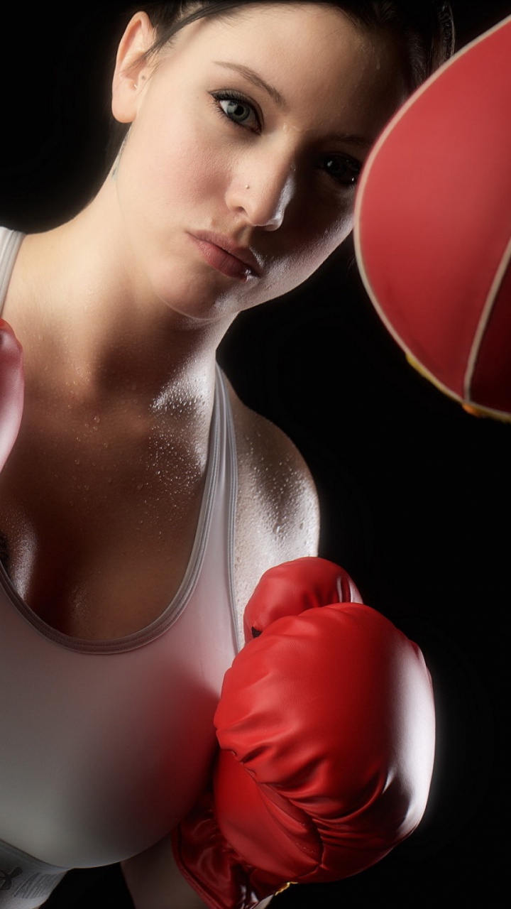 Woman in Red Boxing Gloves. Wallpaper in 720x1280 Resolution