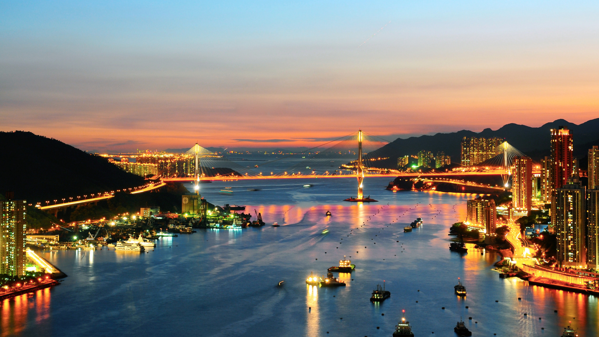 People on Beach Near Bridge During Night Time. Wallpaper in 1920x1080 Resolution