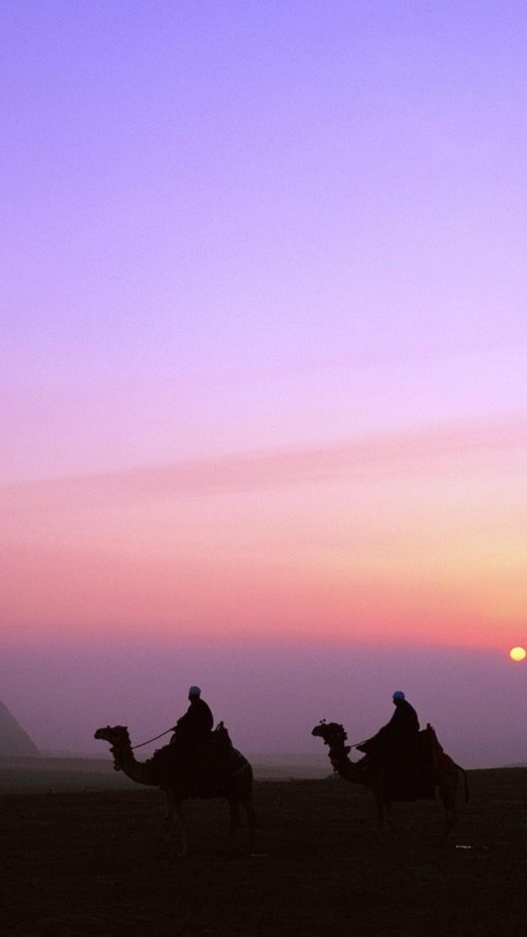 Silhouette of People Sitting on Ground During Sunset. Wallpaper in 1080x1920 Resolution