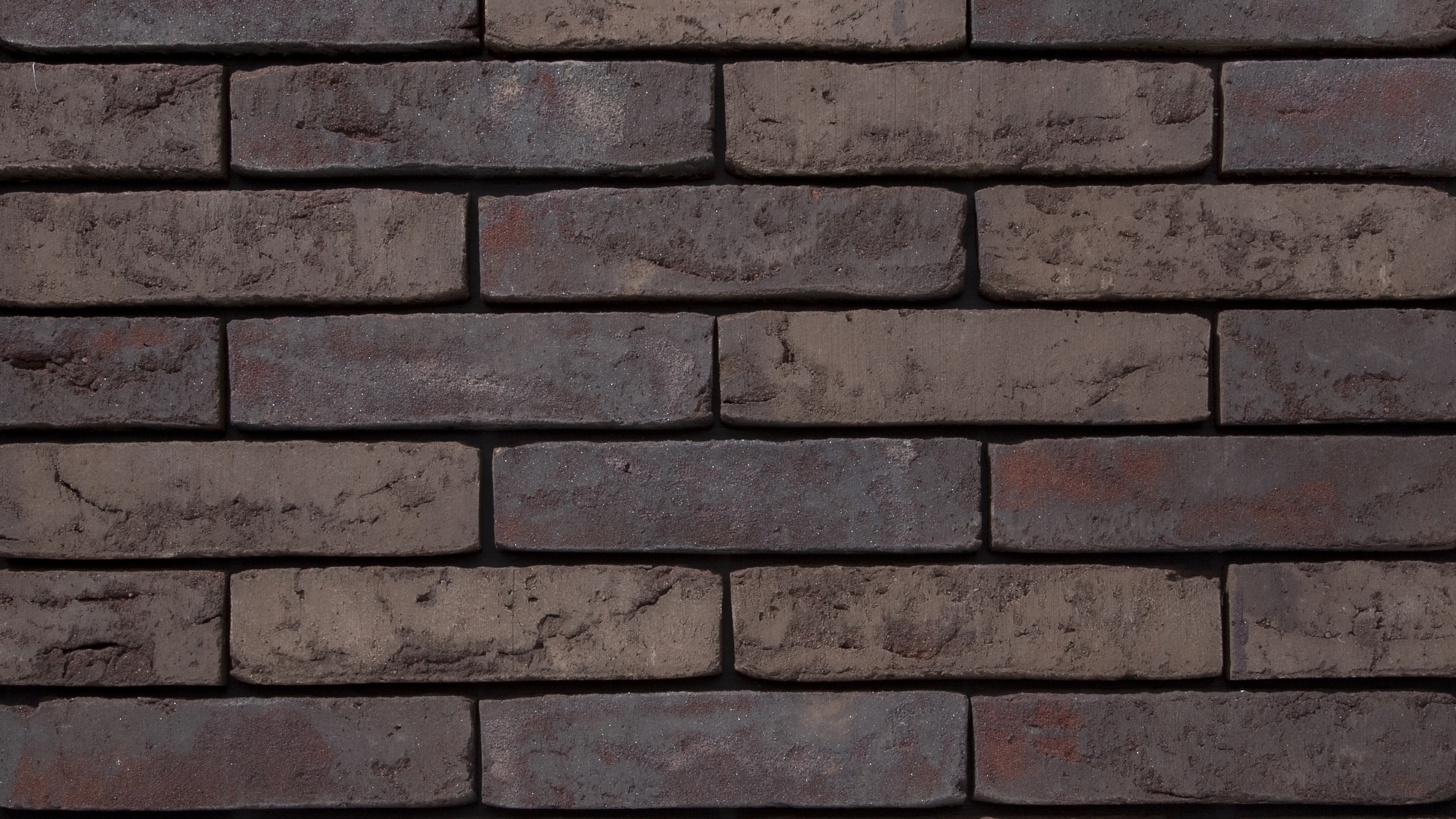 Pared de Ladrillo Marrón y Negro. Wallpaper in 2560x1440 Resolution