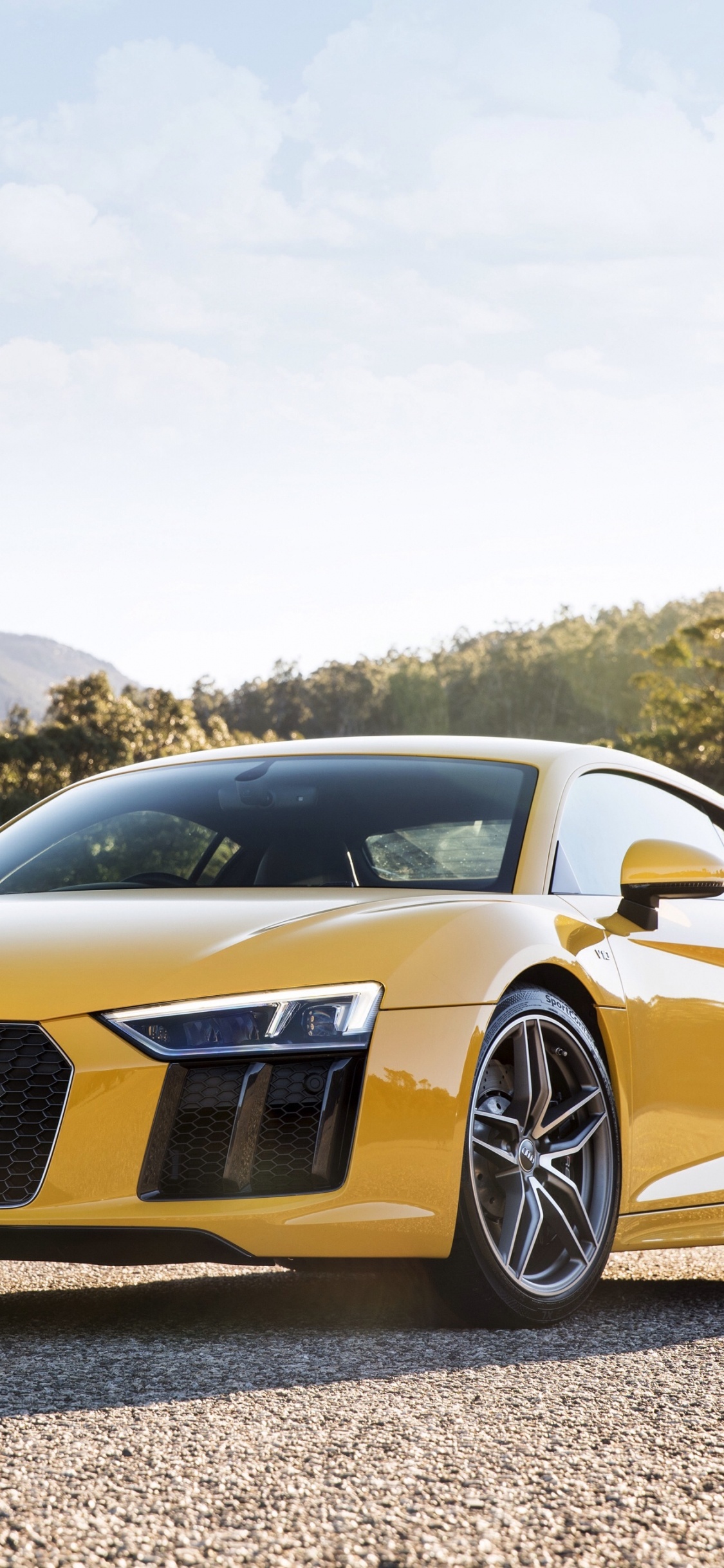 Yellow and Black Porsche 911 on Road During Daytime. Wallpaper in 1125x2436 Resolution