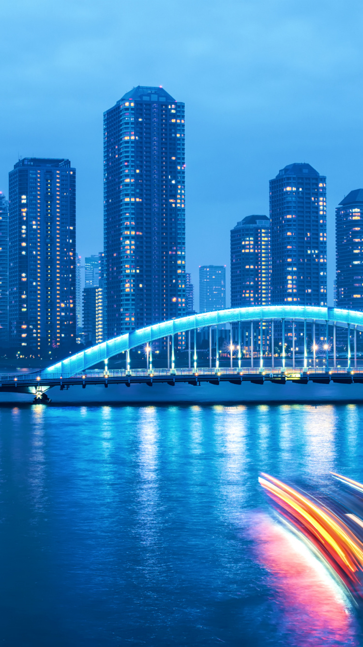 Time Lapse Photography of City Skyline During Night Time. Wallpaper in 750x1334 Resolution
