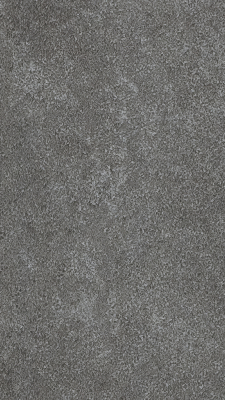 Person in Black Shoes Standing on Gray Carpet. Wallpaper in 750x1334 Resolution