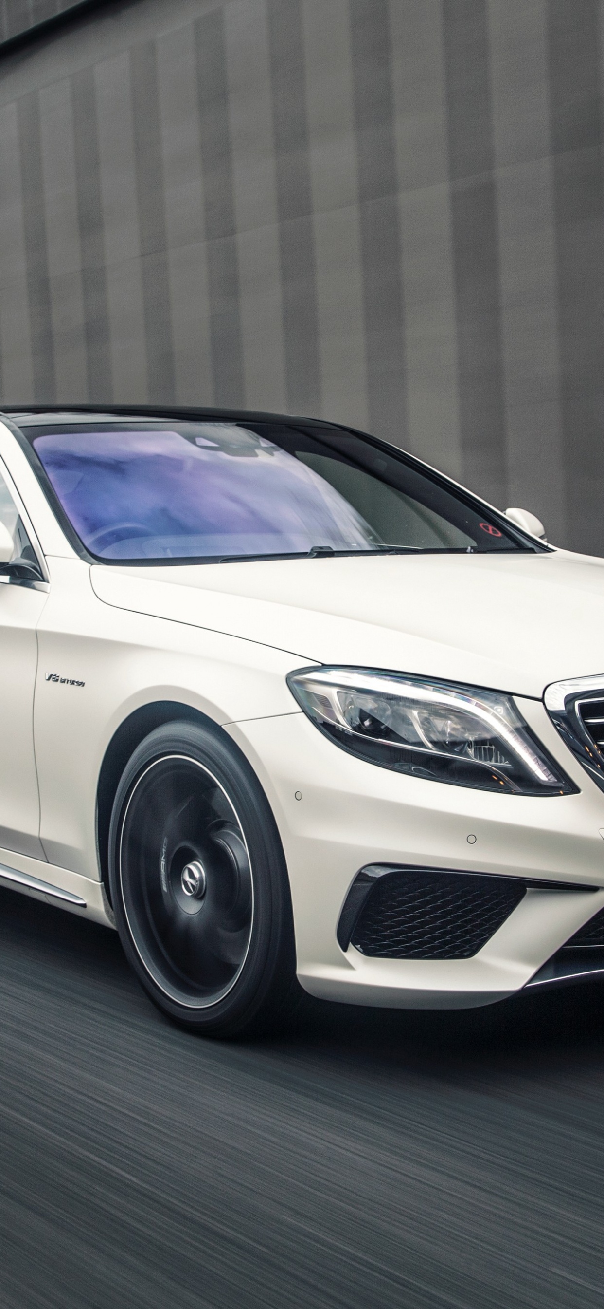 Silver Mercedes Benz Coupe on Road. Wallpaper in 1242x2688 Resolution