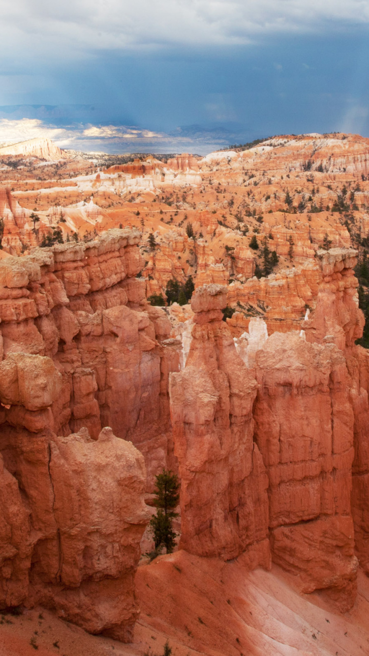 Brown Rock Formation Under Blue Sky During Daytime. Wallpaper in 750x1334 Resolution
