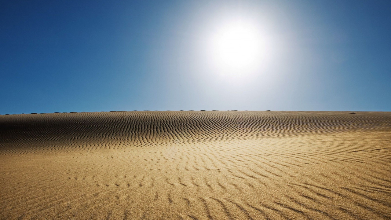 Brown Sand Under Blue Sky During Daytime. Wallpaper in 1280x720 Resolution