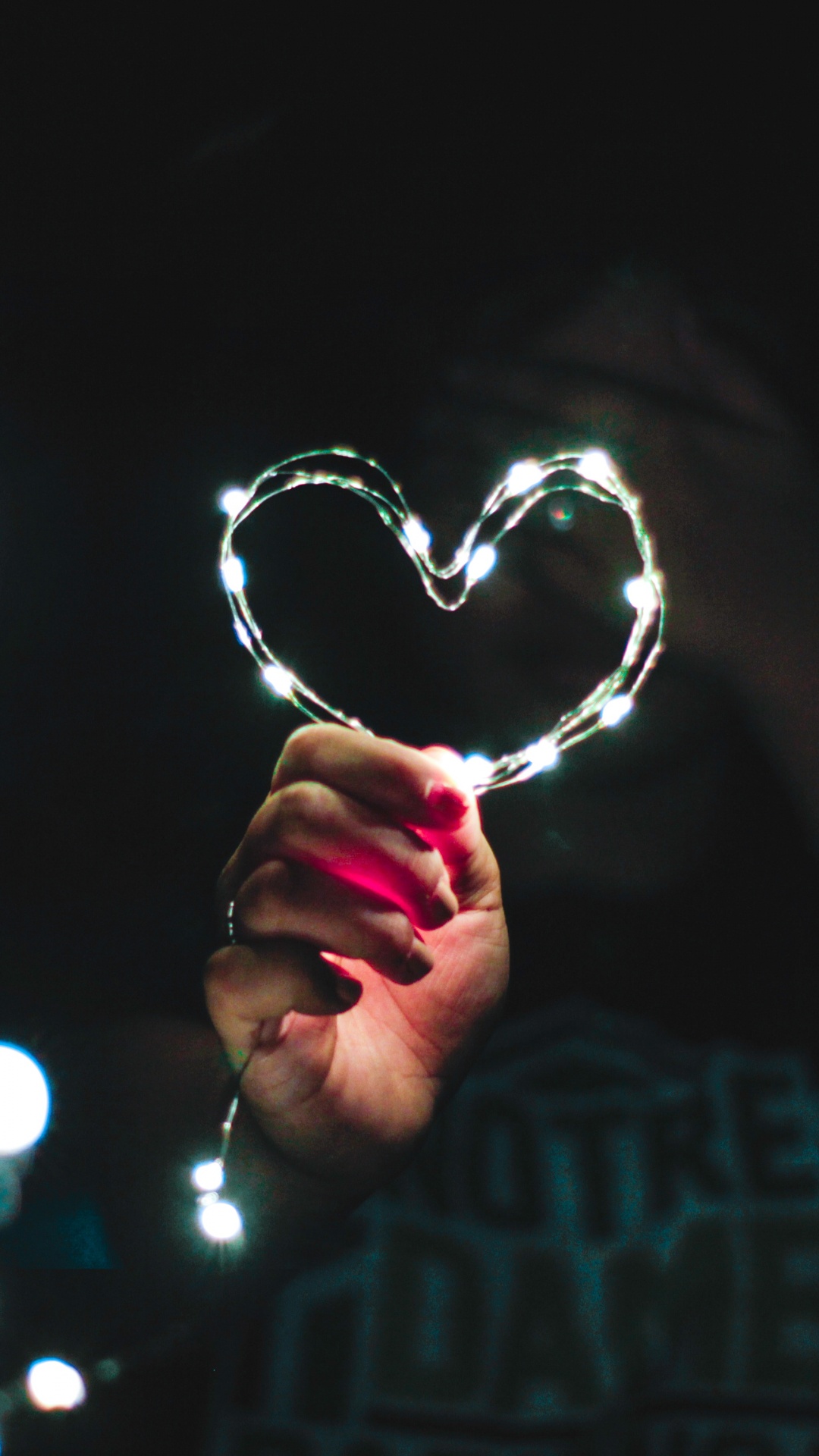 Person Holding Heart Shaped Silver Ring. Wallpaper in 1080x1920 Resolution