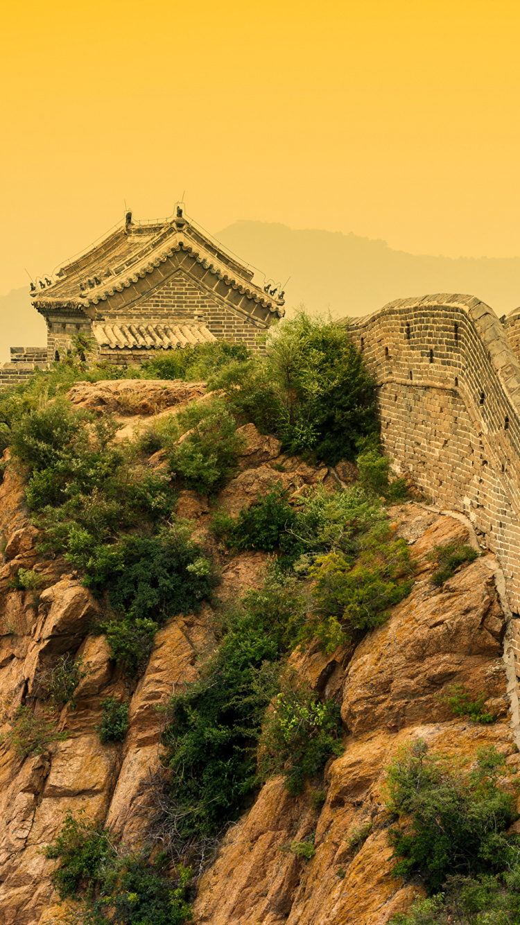 Brown Concrete Building on Brown Rocky Mountain During Daytime. Wallpaper in 750x1334 Resolution