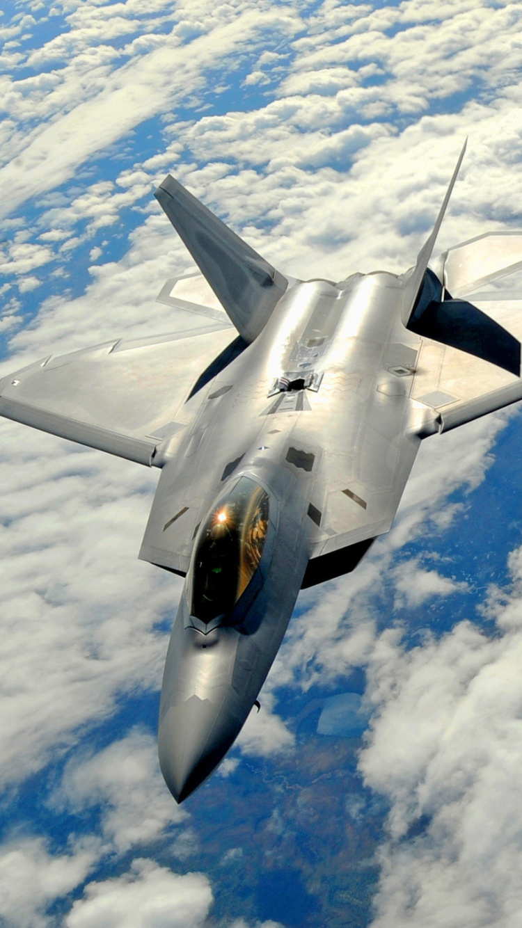 Black Jet Plane Flying in The Sky During Daytime. Wallpaper in 750x1334 Resolution