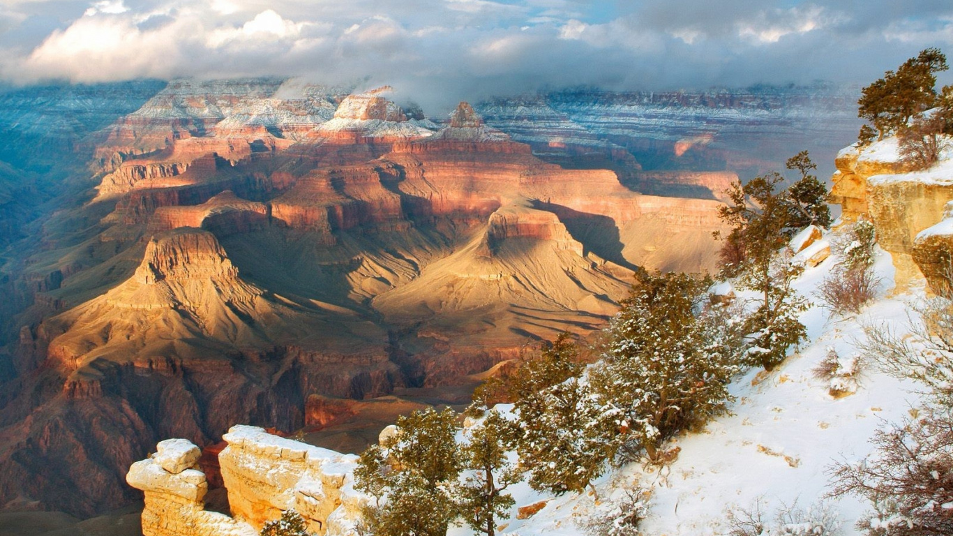 Brown Rocky Mountain Under White Clouds During Daytime. Wallpaper in 1366x768 Resolution