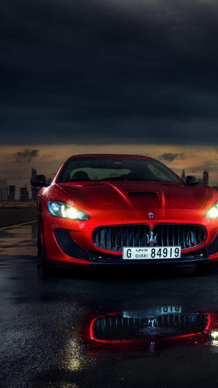 Bmw m 3 Rojo en la Carretera Durante la Noche. Wallpaper in 750x1334 Resolution