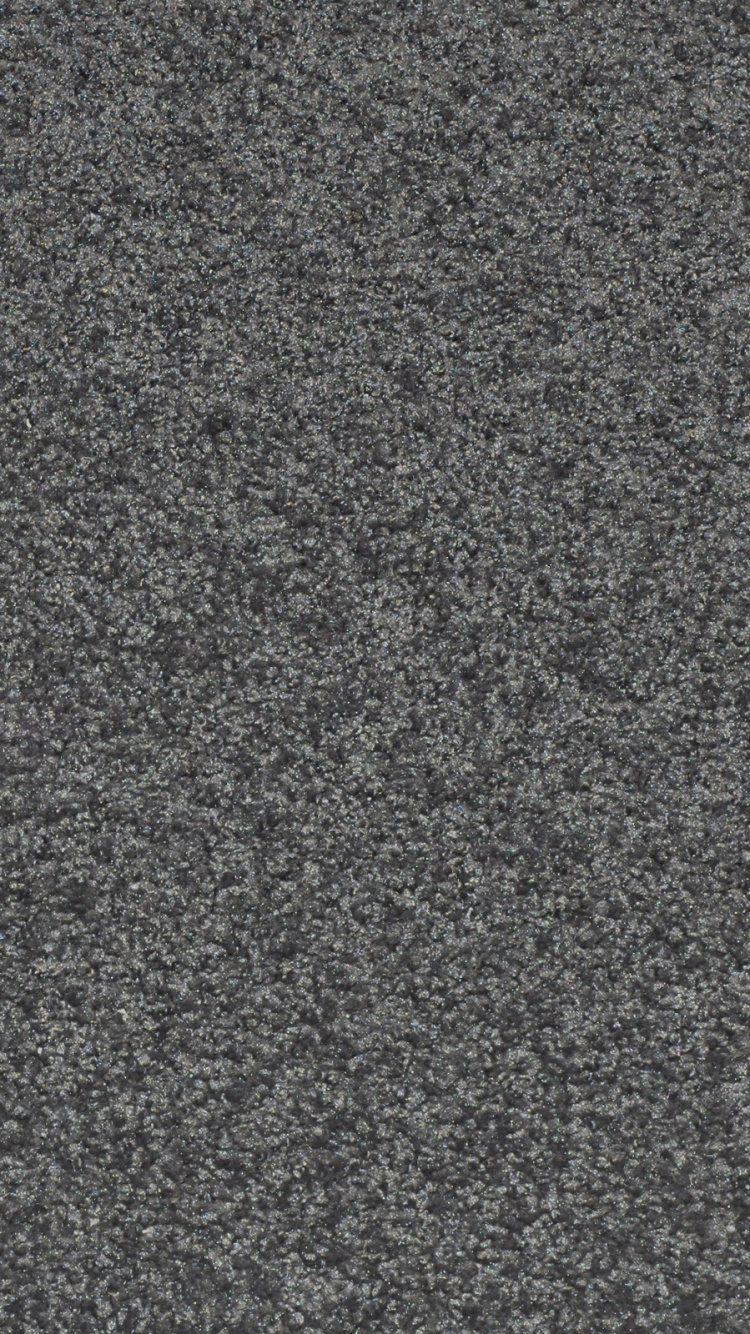 Person in Schwarzen Schuhen, Die Auf Grauem Boden Steht. Wallpaper in 750x1334 Resolution