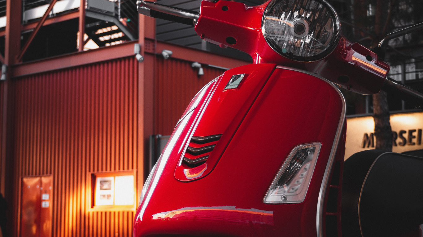 Red Motor Scooter Parked Near Building. Wallpaper in 1366x768 Resolution