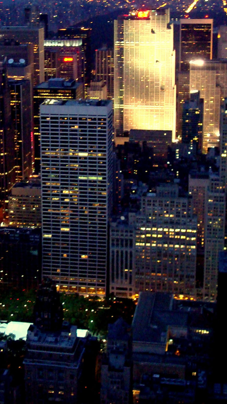Aerial View of City Buildings During Night Time. Wallpaper in 750x1334 Resolution
