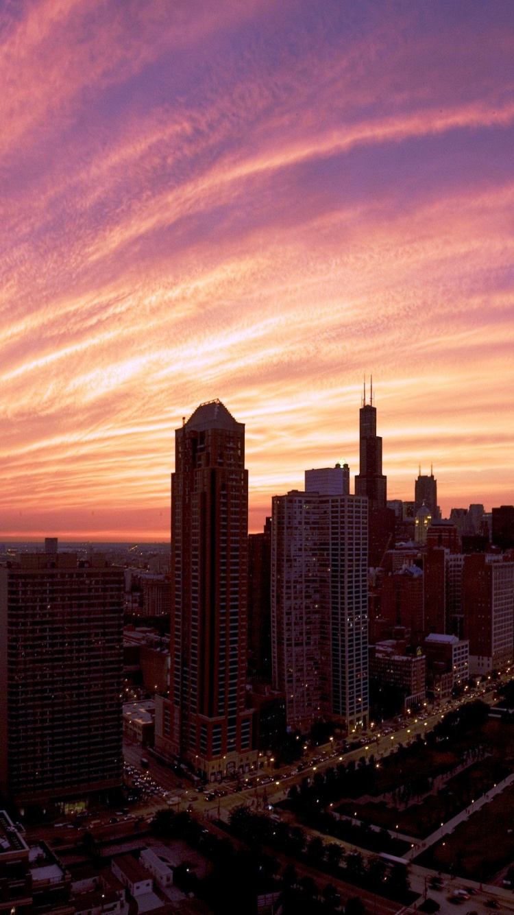 City Skyline Under Cloudy Sky During Daytime. Wallpaper in 750x1334 Resolution