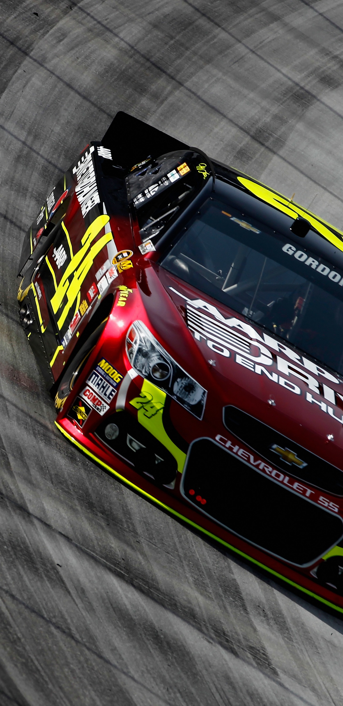 Red and Blue Racing Car on Gray Textile. Wallpaper in 1440x2960 Resolution