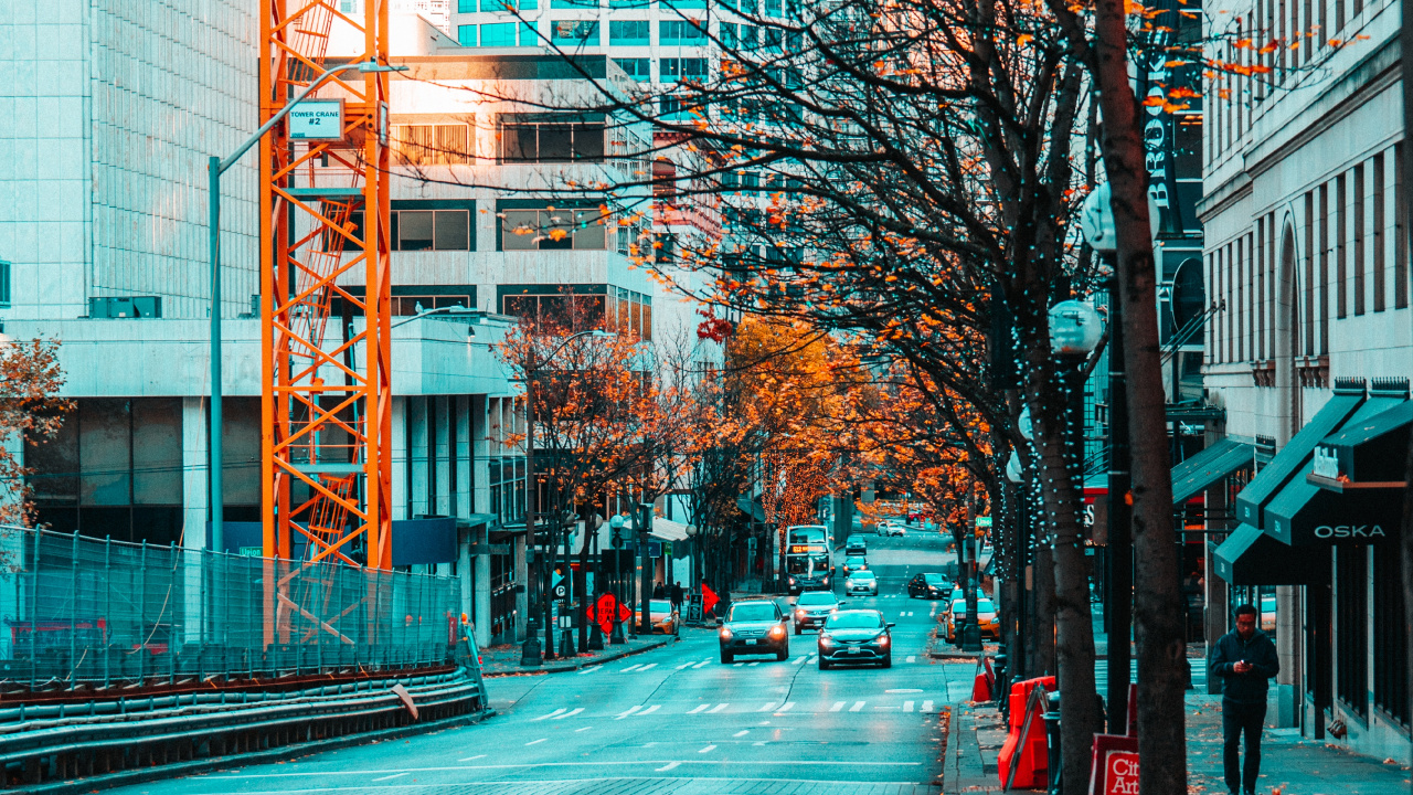 Red Car on Road Near Building During Daytime. Wallpaper in 1280x720 Resolution