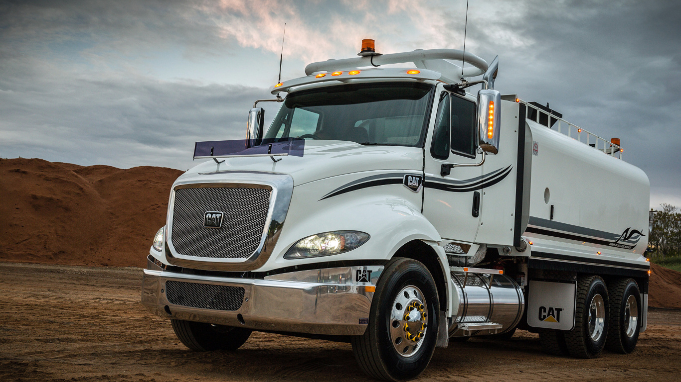 White Truck on Brown Dirt Under White Clouds During Daytime. Wallpaper in 1366x768 Resolution