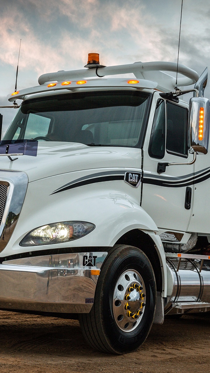 White Truck on Brown Dirt Under White Clouds During Daytime. Wallpaper in 720x1280 Resolution