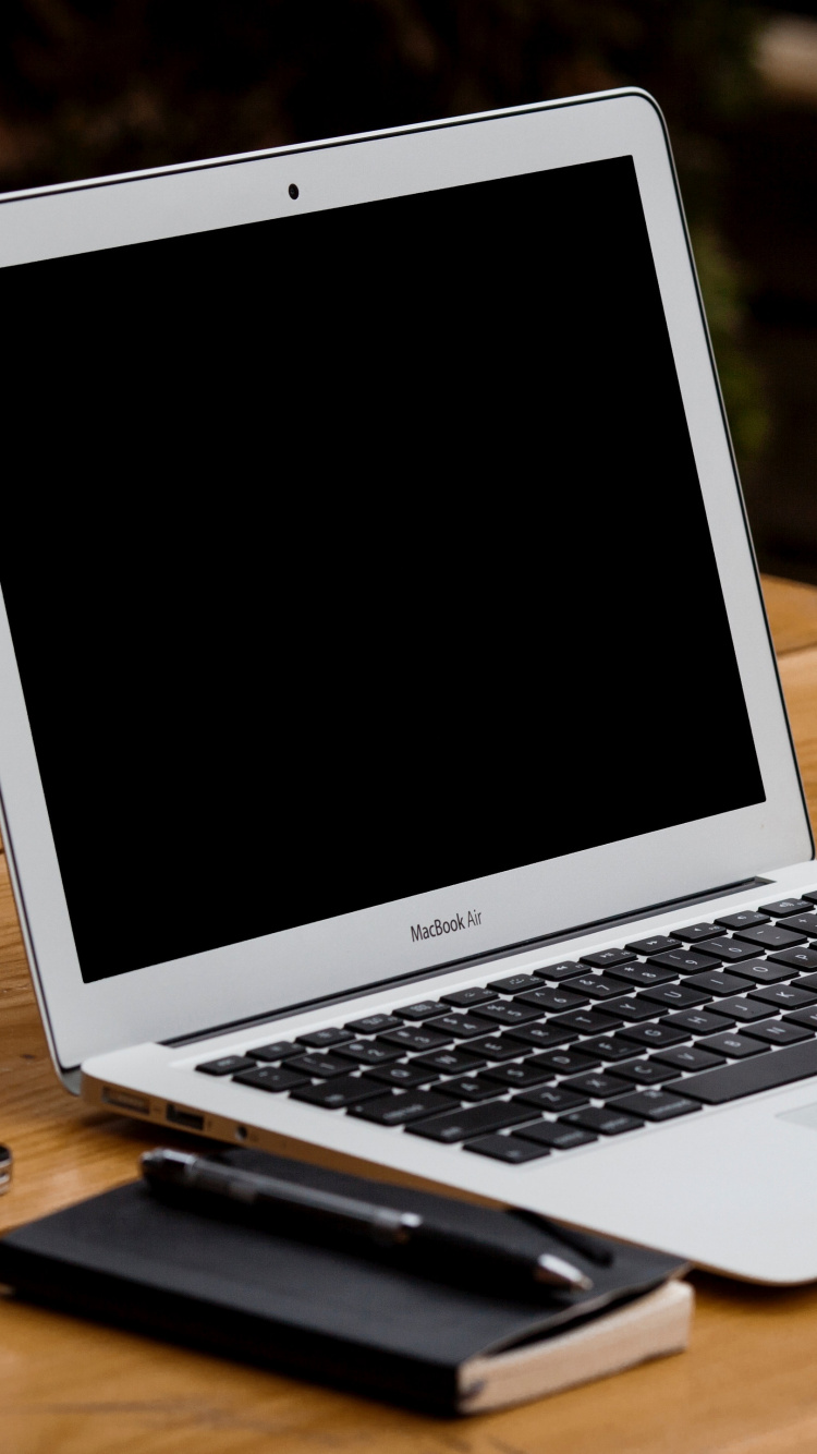 Download 750x1334 Wallpaper Macbook Air on Brown Wooden Table Macbook Air on Brown Wooden Table. Wallpaper in 750x1334 Resolution