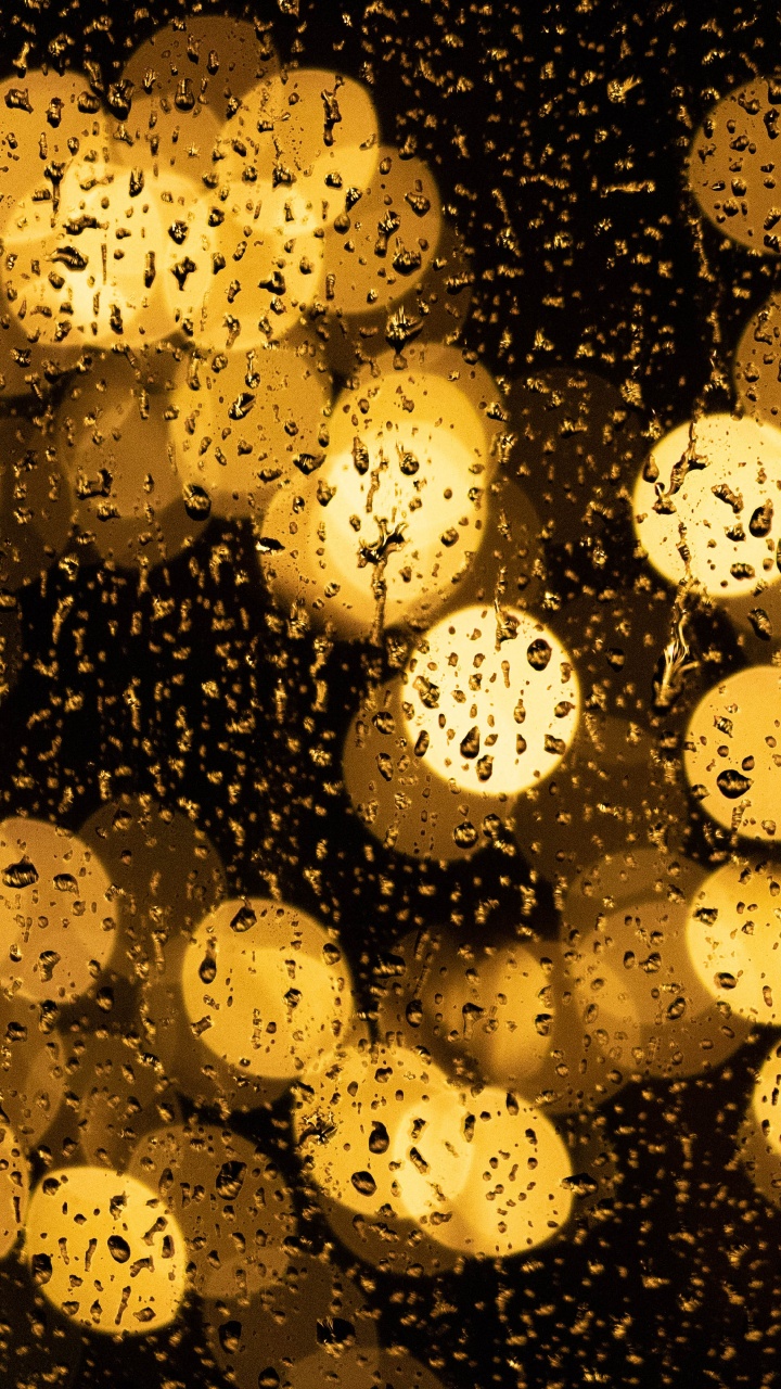 Yellow Light on Black Background. Wallpaper in 720x1280 Resolution