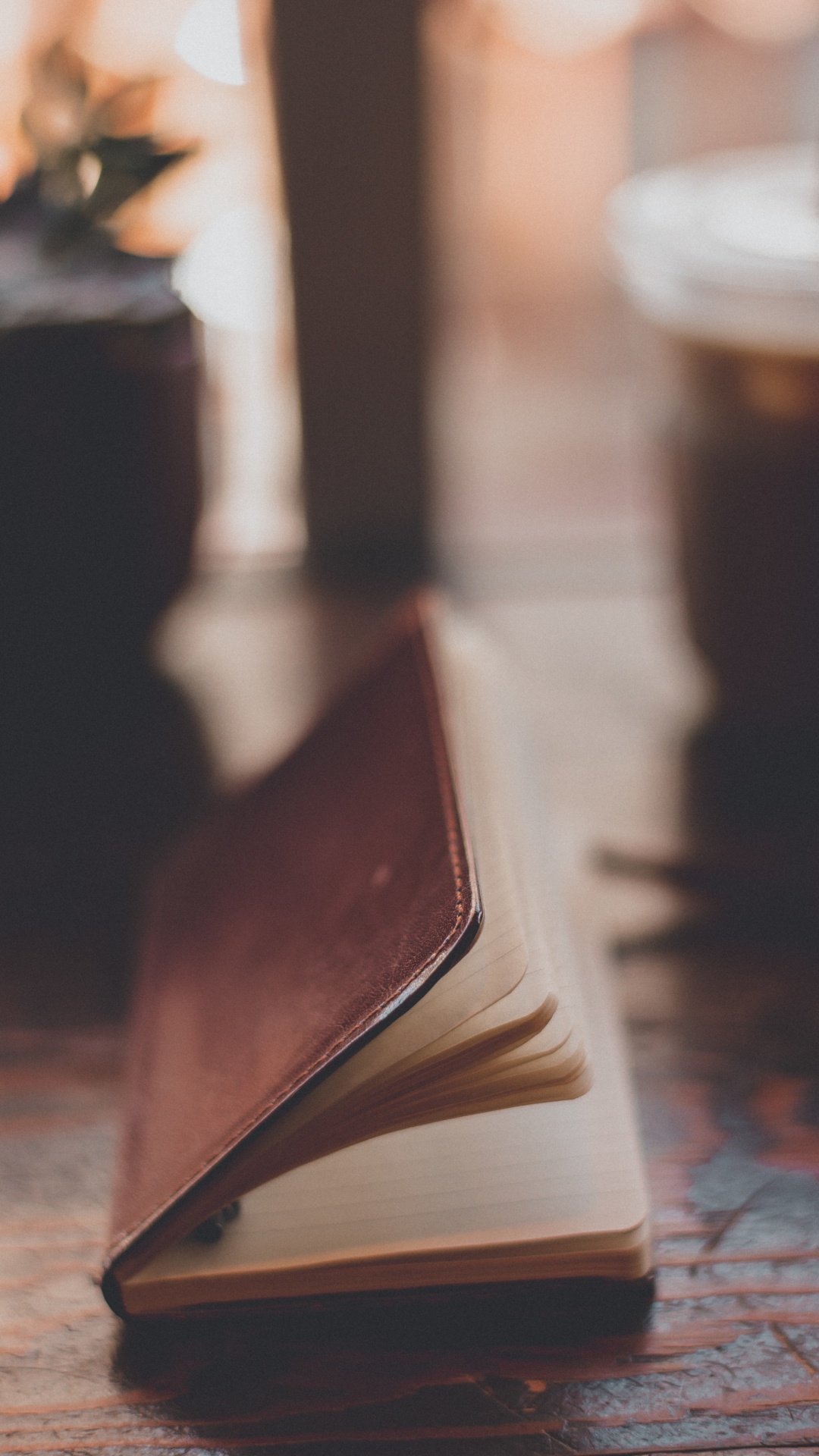 Brown Book on Brown Wooden Table. Wallpaper in 1080x1920 Resolution