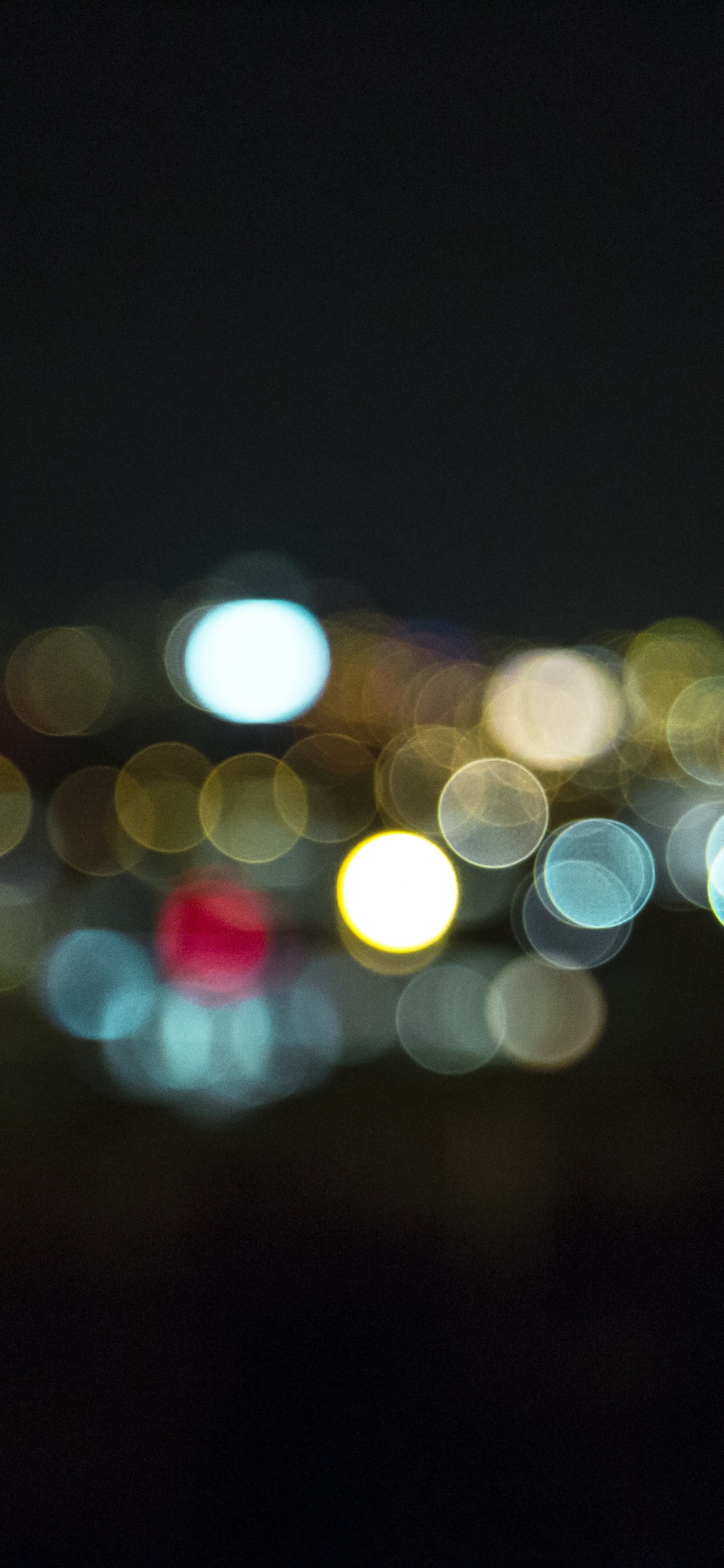 Yellow and Red Bokeh Lights. Wallpaper in 1242x2688 Resolution